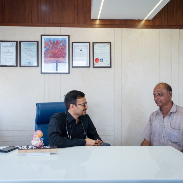 Dr Ravi with Patient